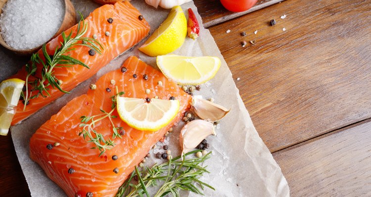 Raw salmon on baking paper