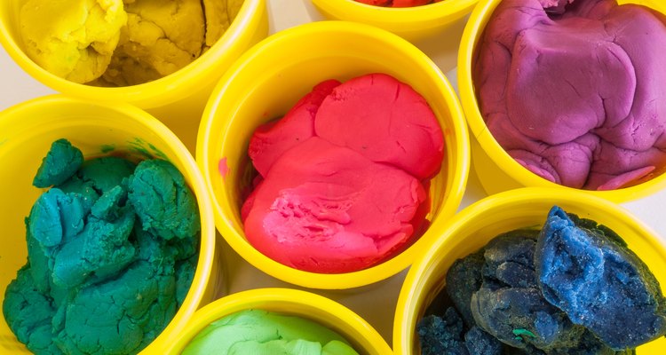 colorful play dough in yellow can