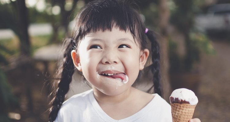 Asia Girl eating ice cream.