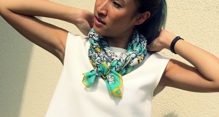 The twist around scarf tie adapts to any style of clothing.