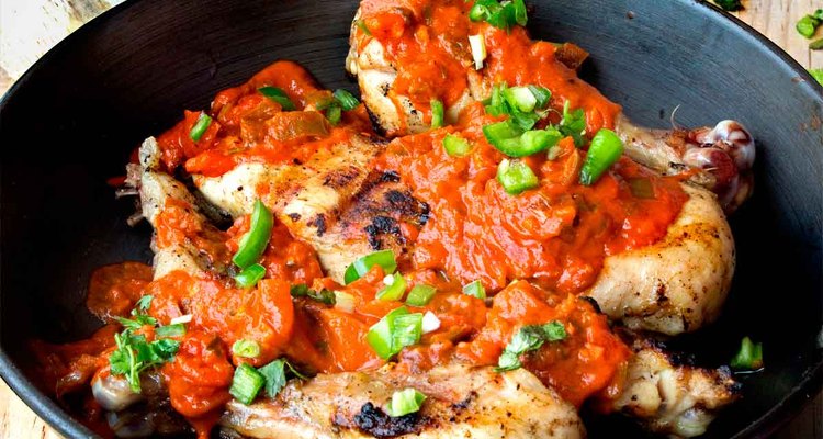 Brazilian grilled chicken topped with a tomato-coconut sauce