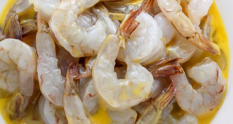 Coat the shrimp in the egg wash.