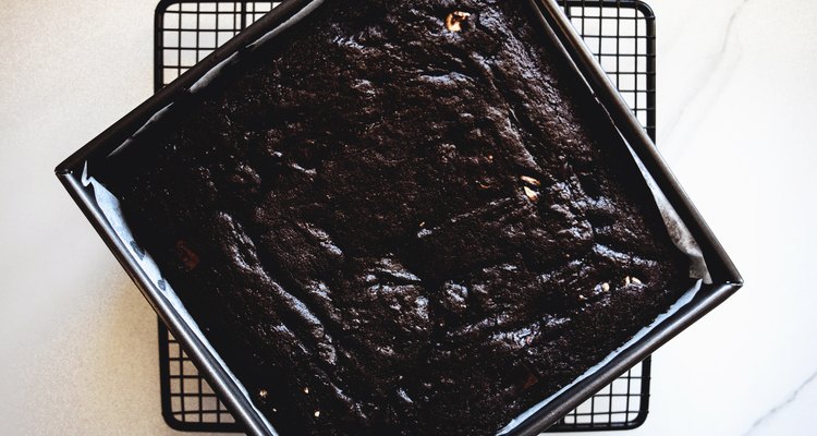 Bake the brownie until the top is glossy and cracked.