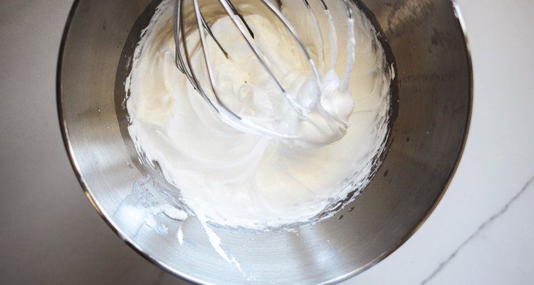 The meringue is ready when it forms stiff and glossy peaks.