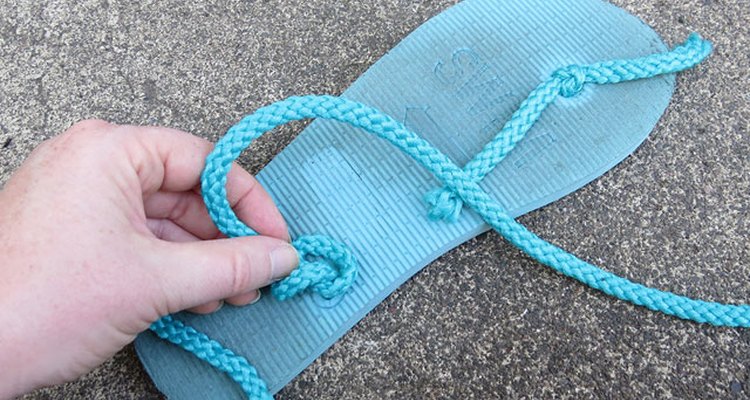 Tie rope into double knot.