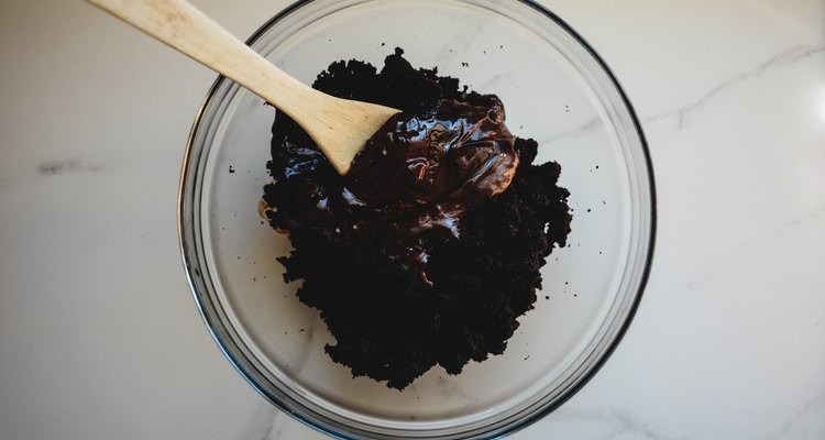 Mix the chocolate ganache into the cake crumbs until it forms a moist ball.