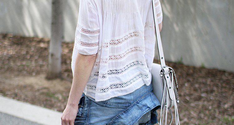 White lace top, skinny jeans, denim jacket