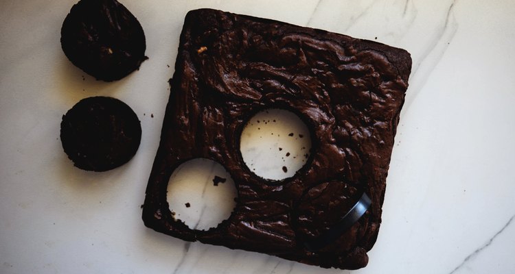 Use a small cookie cutter to neatly stamp out circles in the brownie.