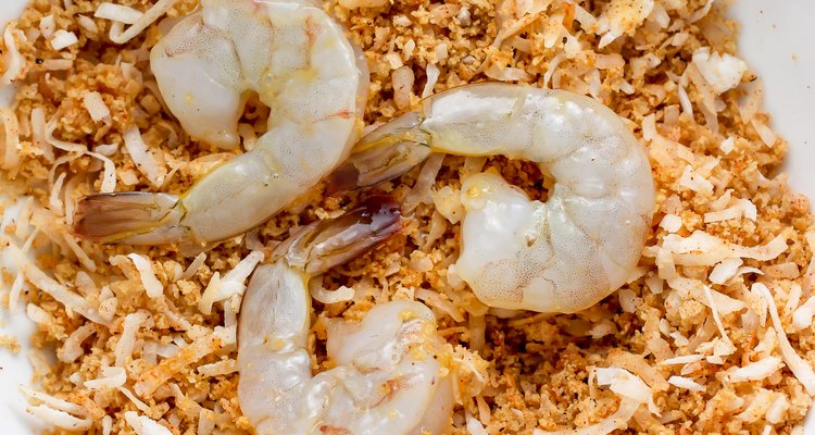 Coat the shrimp in the coconut panko mix.