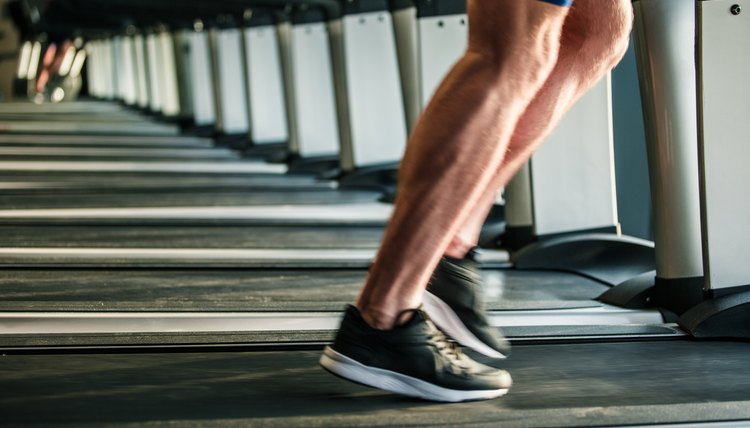 Legs in motion running on treadmill