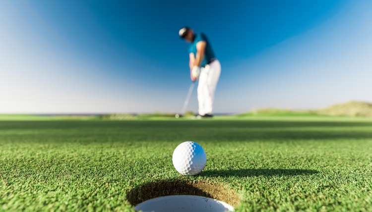 Golf player making a successful stroke - Links Golf