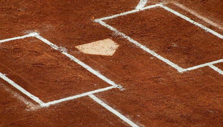 Home of the first base with white chalk lines in a baseball field