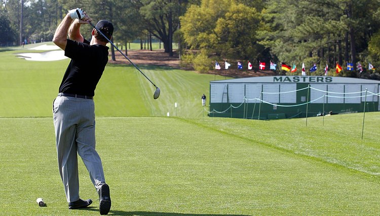 Nick Faldo of Britain tees off on the new tee box