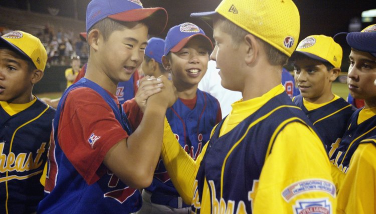 Hirofumi Yamazaki shakes hands with Matt Overton