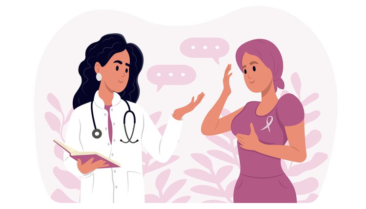Breast Cancer Awareness Month. A young smiling female doctor is talking to a woman with cancer in a scarf. The woman is recovering from chemotherapy, a survivor.