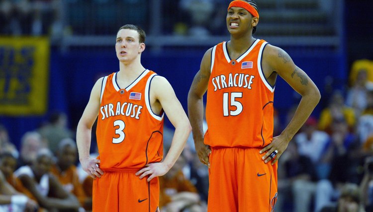 Gerry McNamara stands next to Carmelo Anthony 