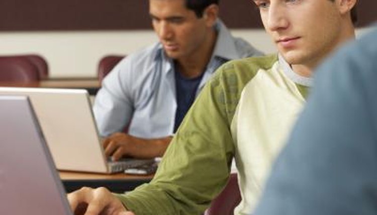 College students in class on laptops