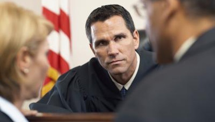 Judge listening to case.