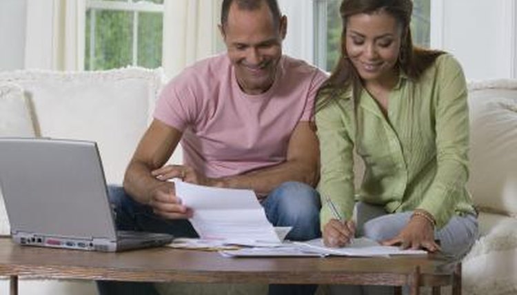 Couple filling out forms