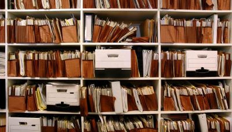 Business documents archived on shelves.