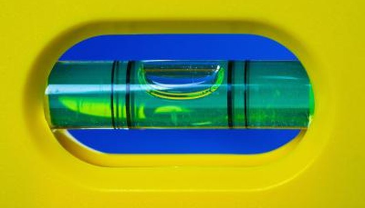 Walkway surfaces are measured with a level and their slopes are expressed as percentages.