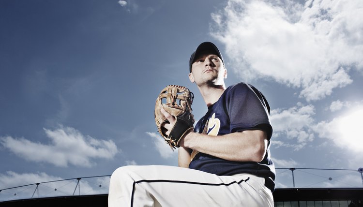 Baseball pitcher preparing to throw ball