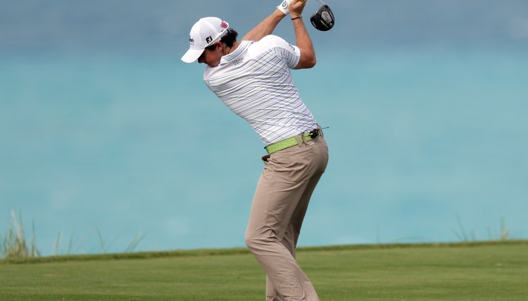 Rory McIlroy's back faces his target at the top of his swing after a full shoulder turn.