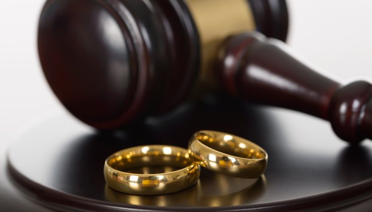 Wedding Rings And Wooden Gavel