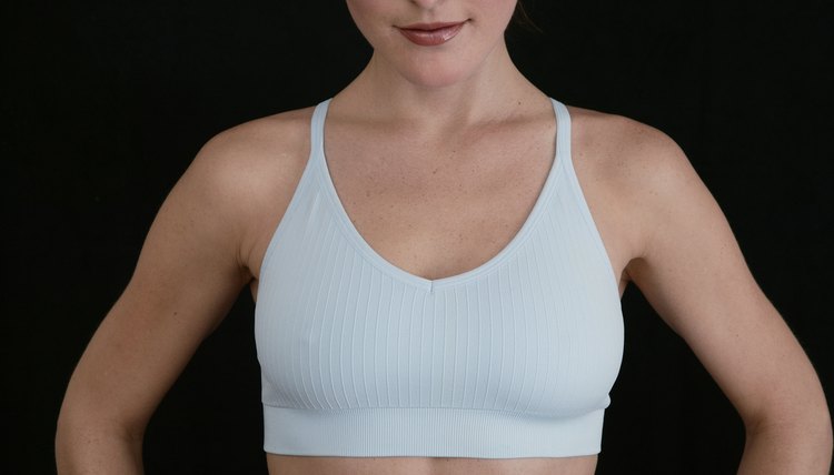 Cropped woman in sports bra