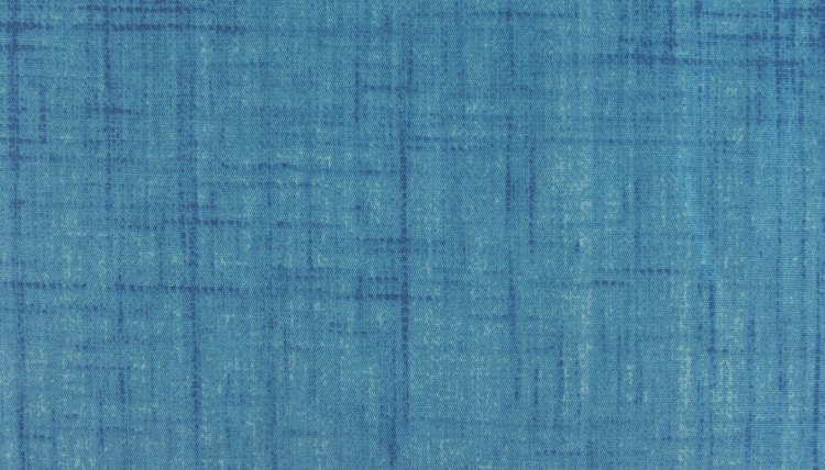 Colored fabrics make for innovative design features in dorm rooms.