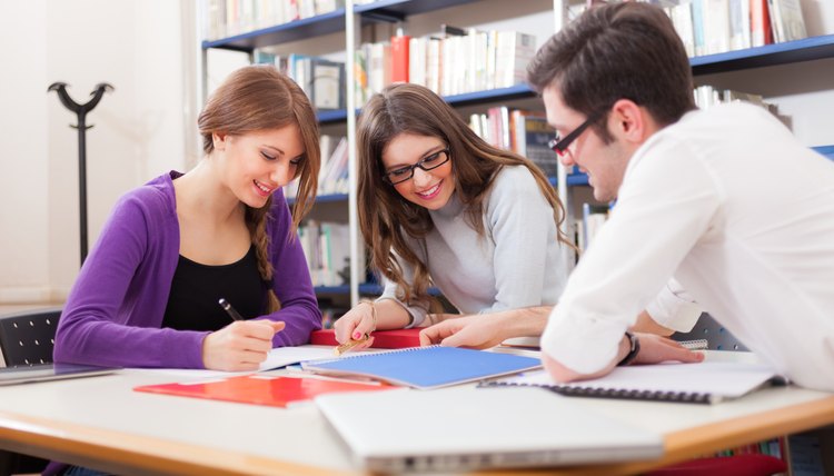 Students studying in library