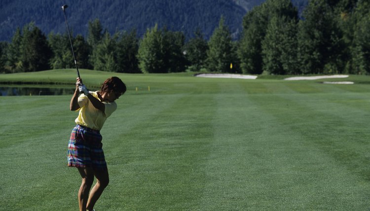 Female golfer ready to swing, Sun Valley, Idaho, USA