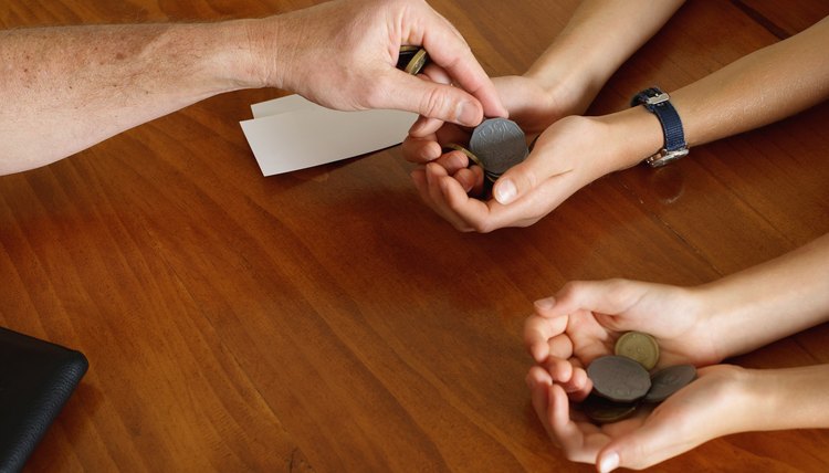 Real or play money can be used in a classroom store.