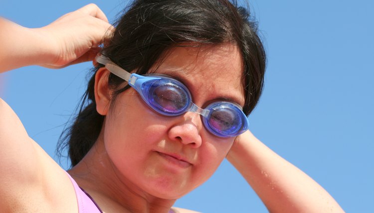 Asian Beatiful Woman Hold Swimming goggles