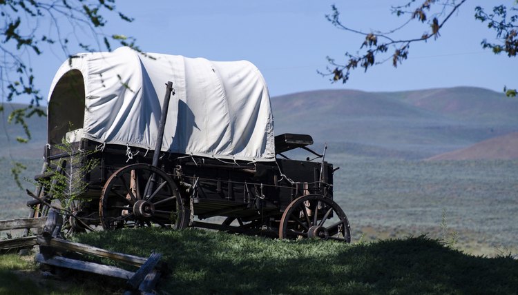 Most pioneers traveled West with small, covered wagons.