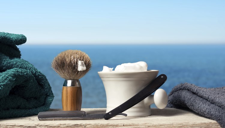Old fashion shaving kit with brush, razor and cream.
