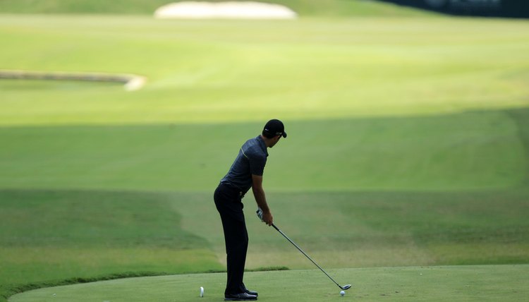 2011 Masters champion Charl Schwartzel sets up much the same as McIlroy does.