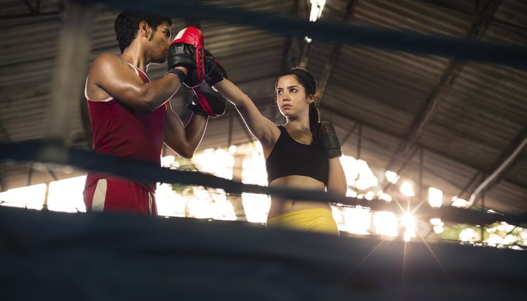 Young woman at boxing and self defense course