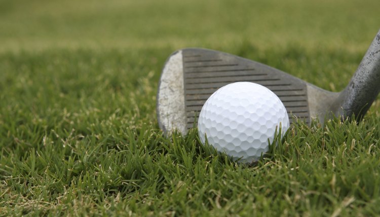 Golf Ball and Pitching Wedge in Grass