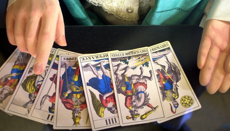 Wiccans may read tarot or practice other forms of magical divination.