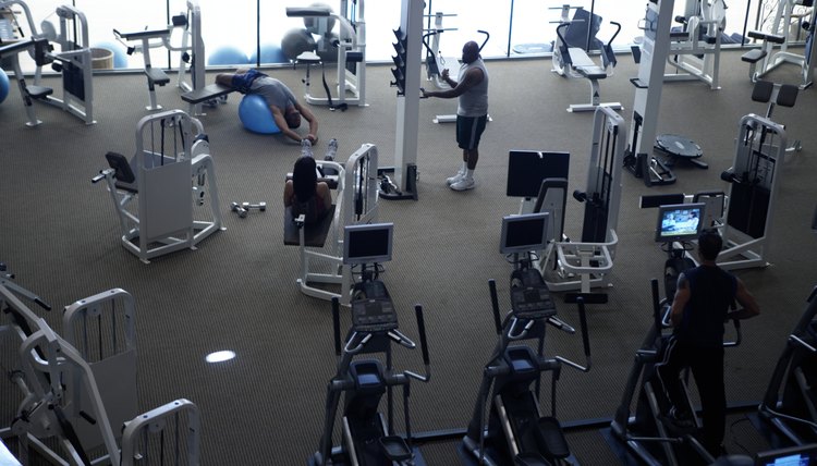 People working out in gym, elevated view