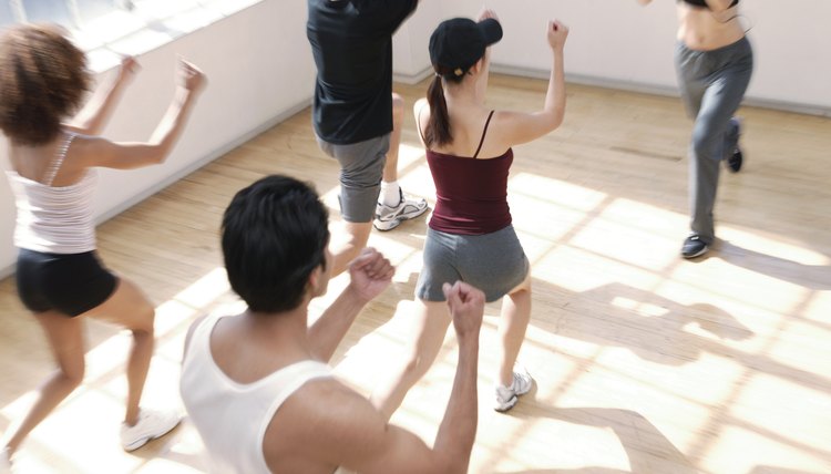 Woman exercising in aerobics class