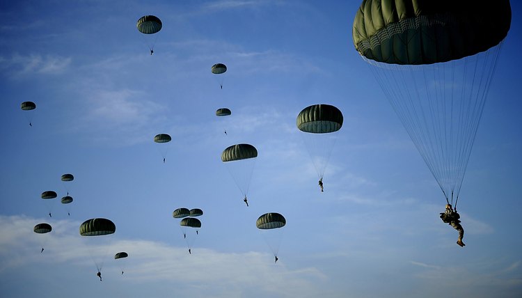 Paratroopers jumping.