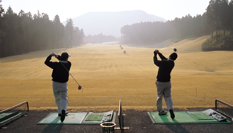 Hitting a couple buckets of balls on the driving range helps burn calories.