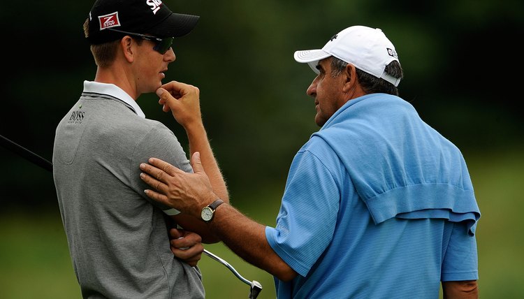 Tour player Henrik Stenson confers with sports psychologist Bob Rotella. Pros understand the importance of the mental game.