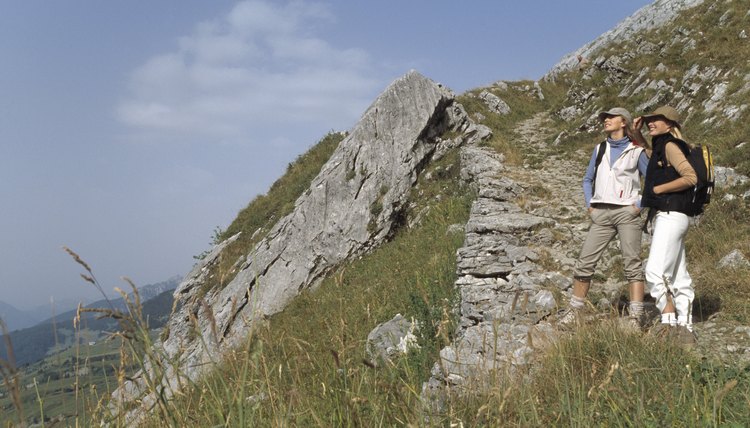 Women hiking on mountainside