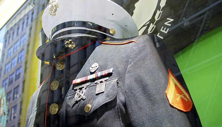 A uniform for the USMC in a store window display.