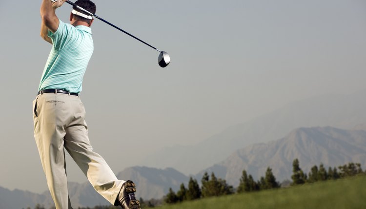 Golfer Hitting Ball Down Fairway