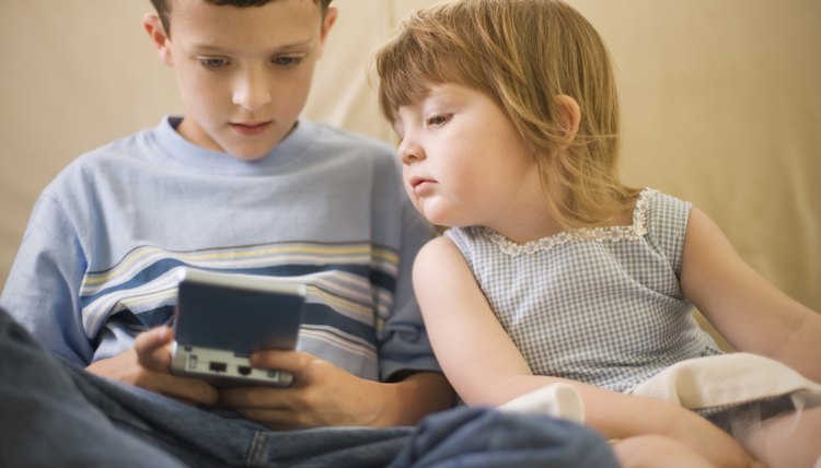Handheld electronic games can help your 4-year-old learn while he plays.