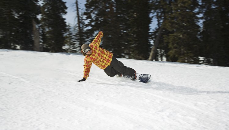 Snowboarder falling